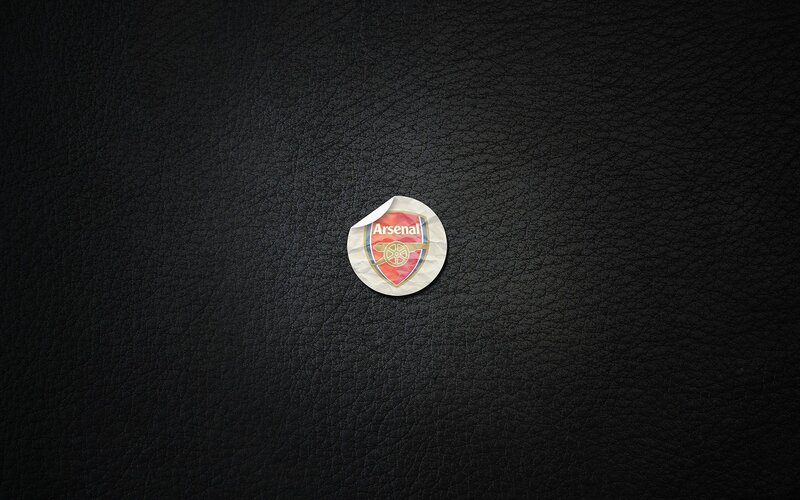 Arsenal logo sticker on leather