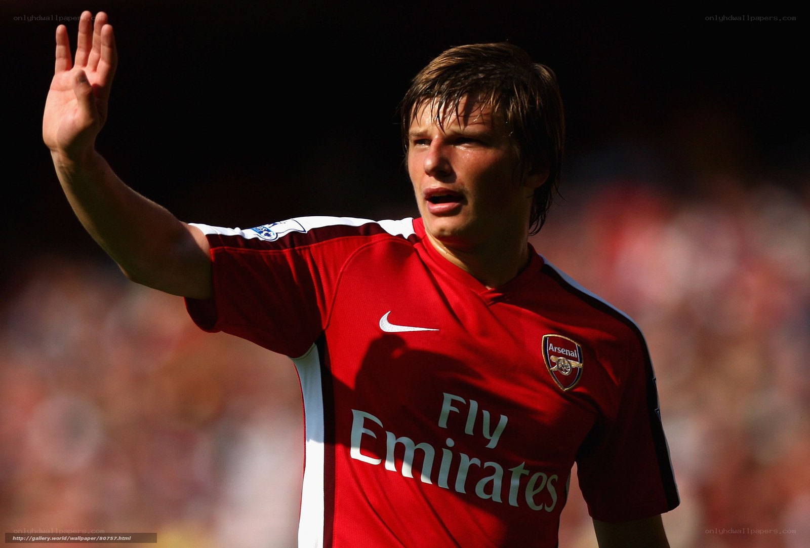 Arsenal player waving