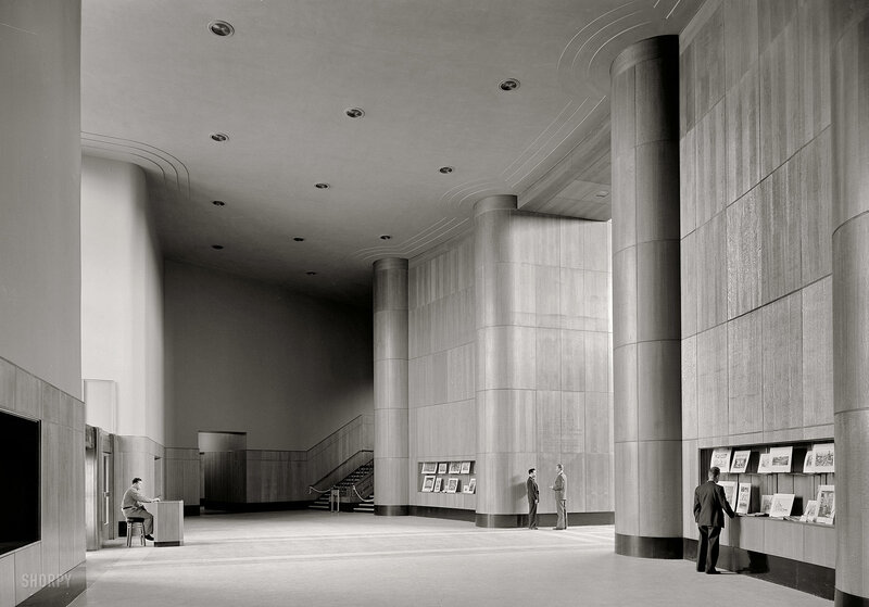 Art gallery interior with visitors