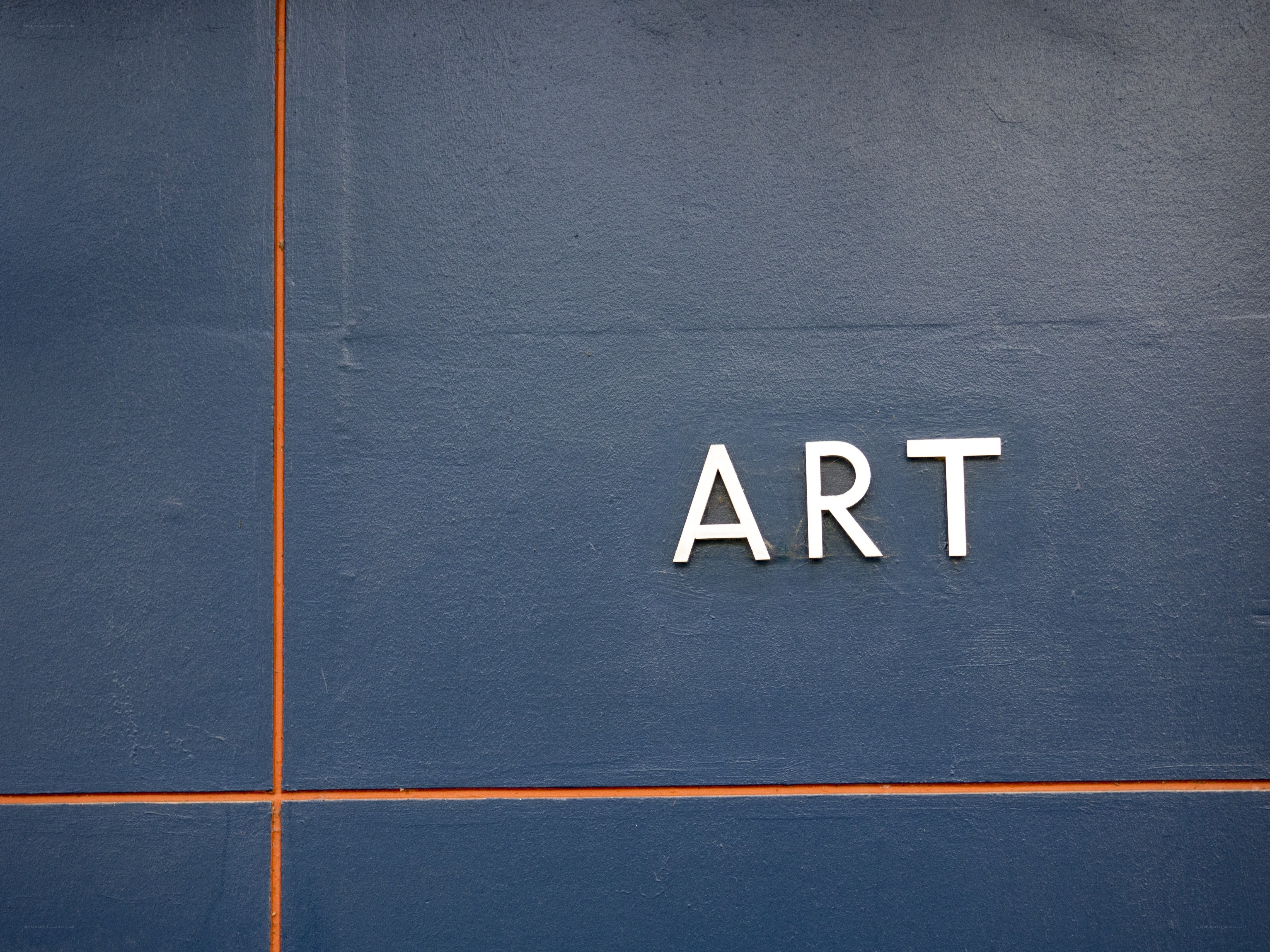 Art sign on blue wall