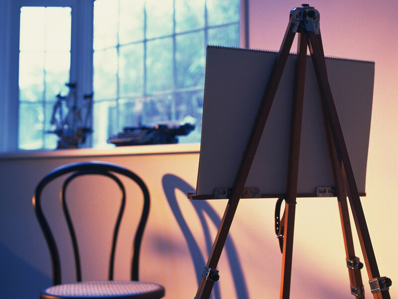 Art studio with easel and chair