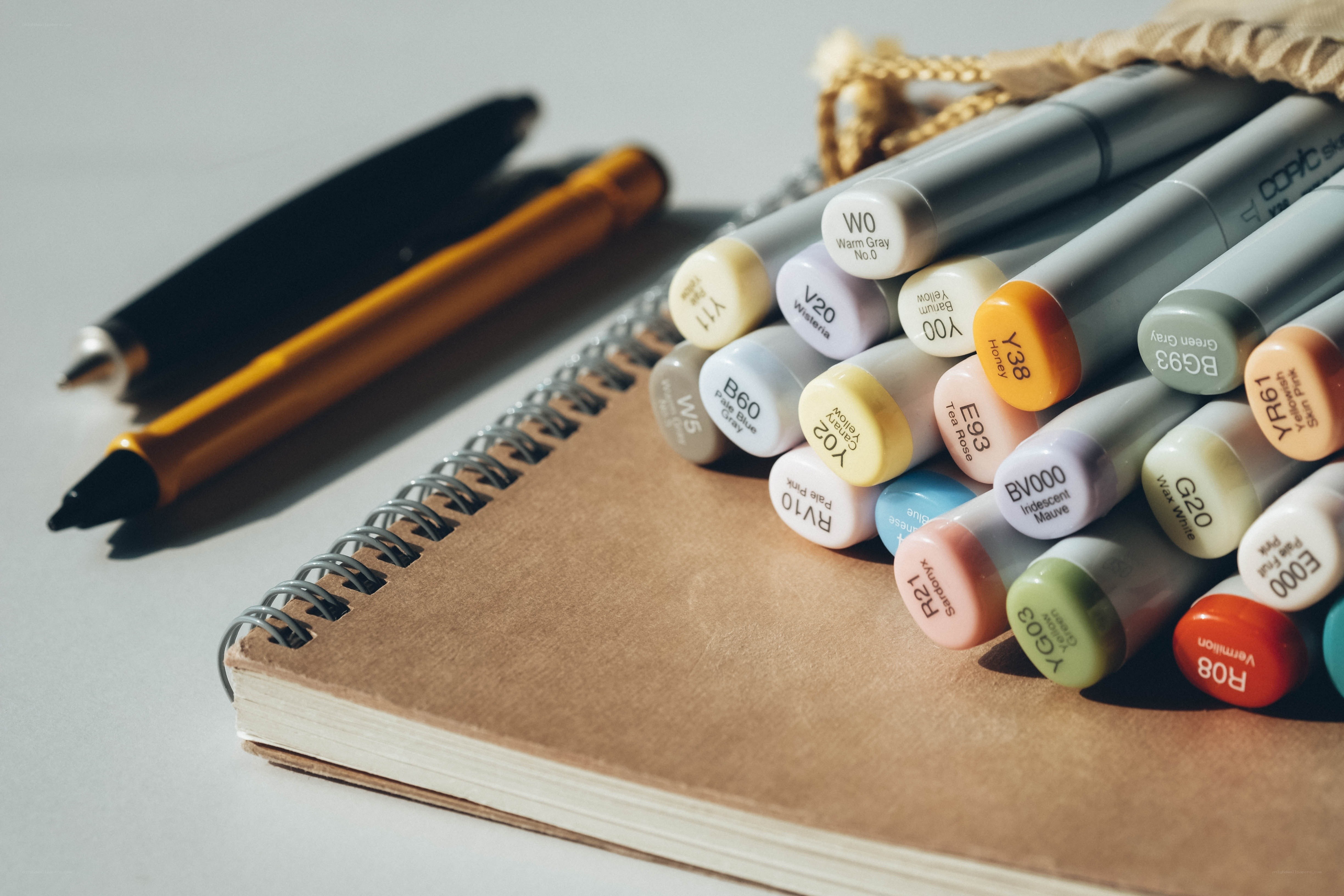 Art supplies on a notebook