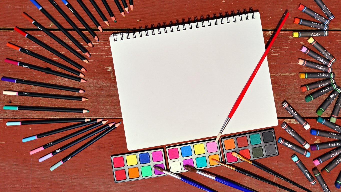 Art supplies on wooden table