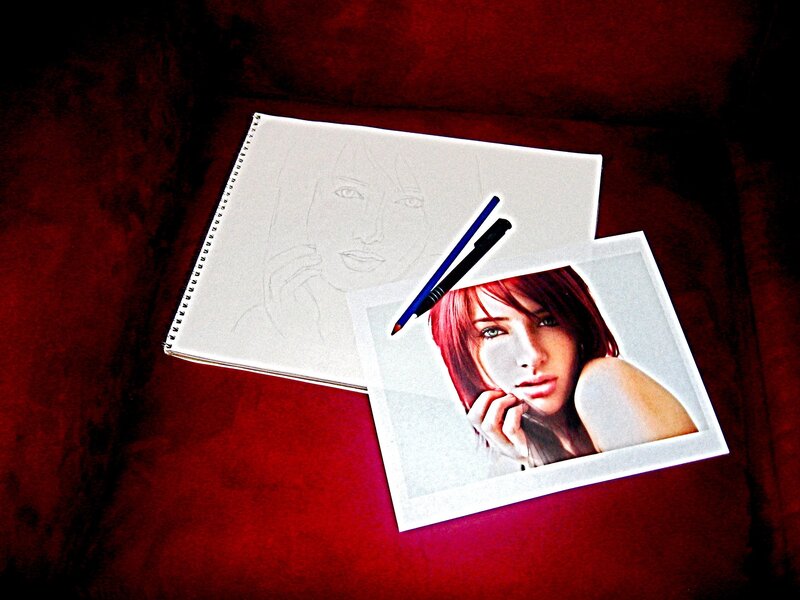 Art supplies with portrait reference