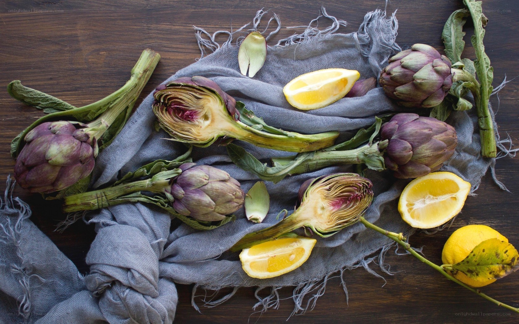 Artichokes and lemons on cloth