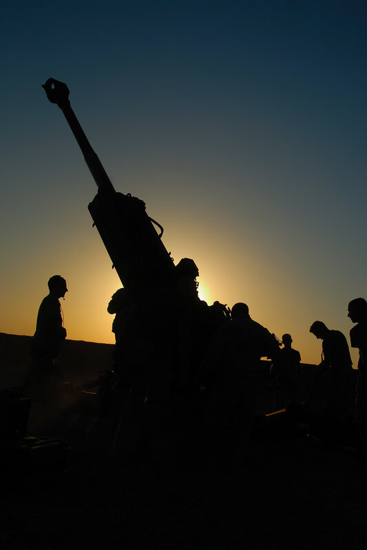 Artillery crew at sunset