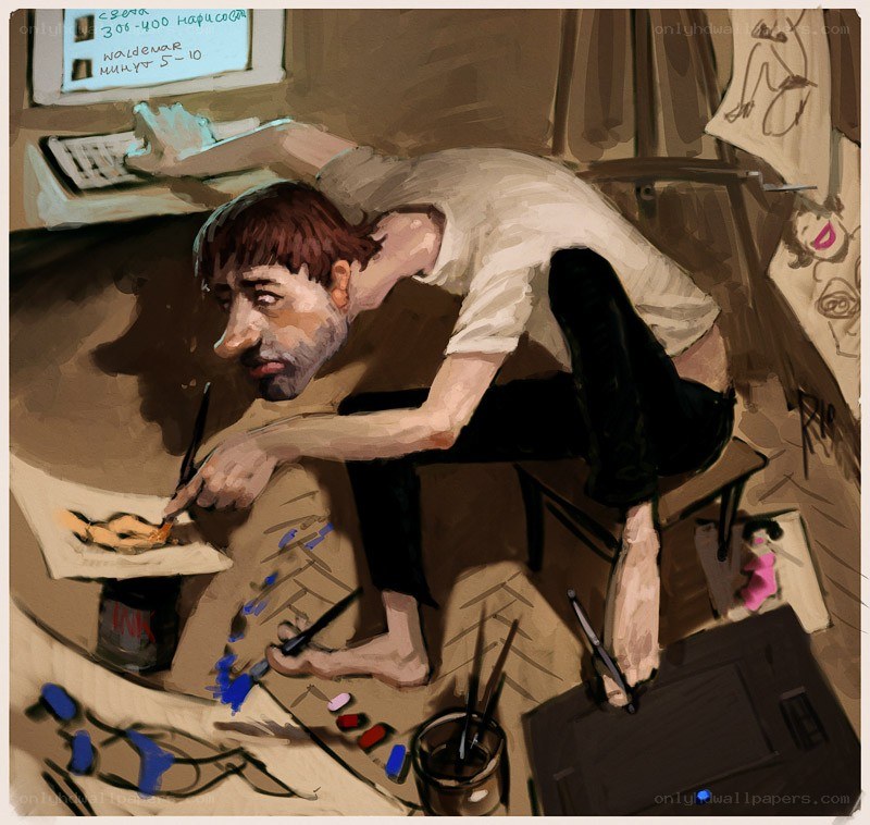 Artist at his desk