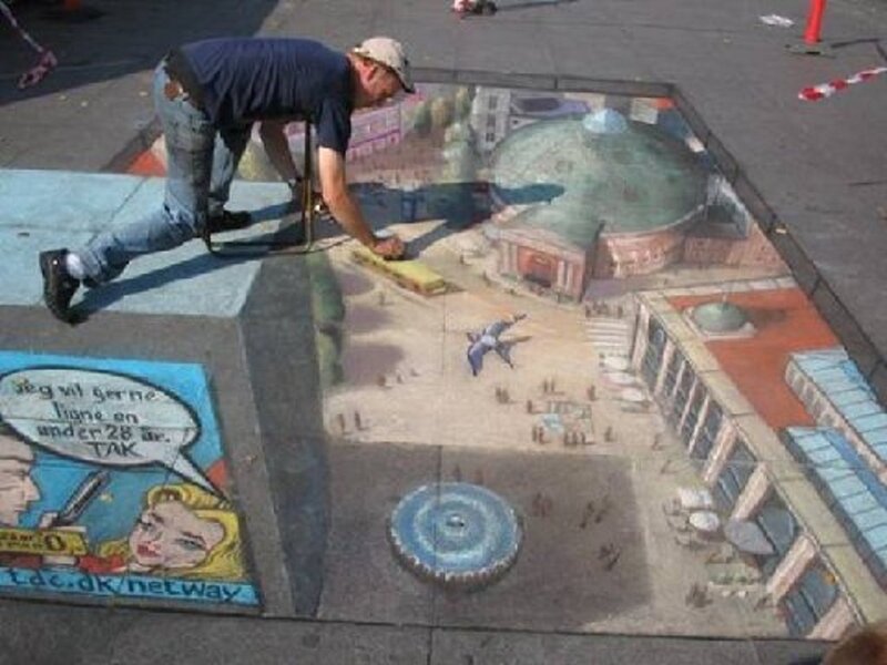 Artist Creating Chalk Drawing