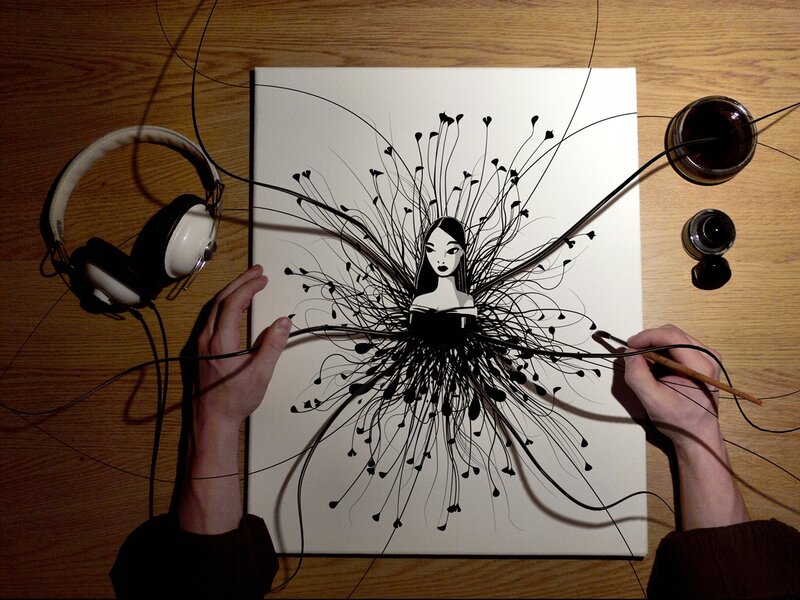 Artist drawing a woman with ink