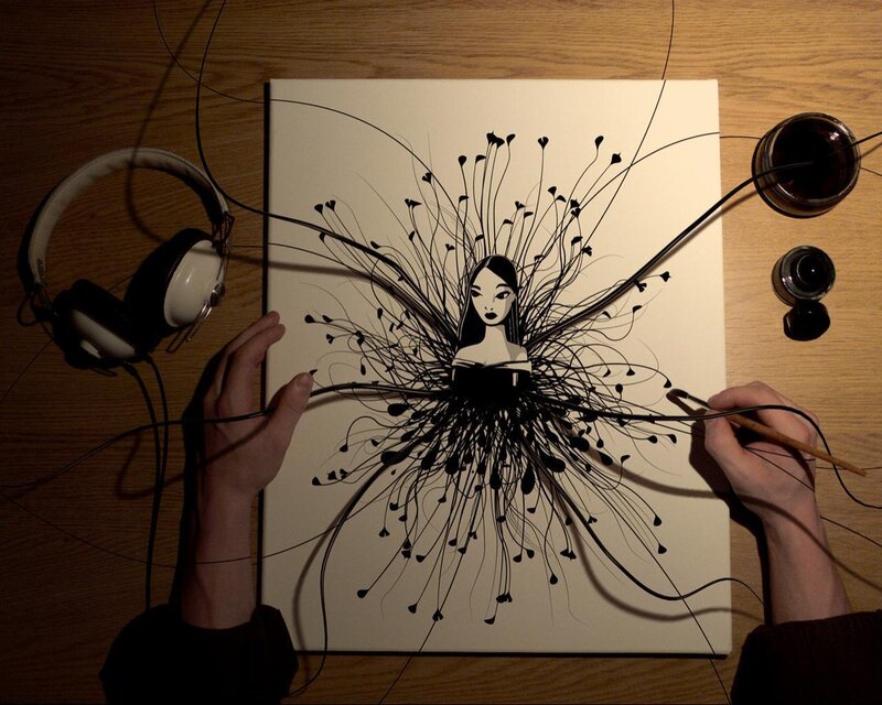 artist drawing a woman with ink