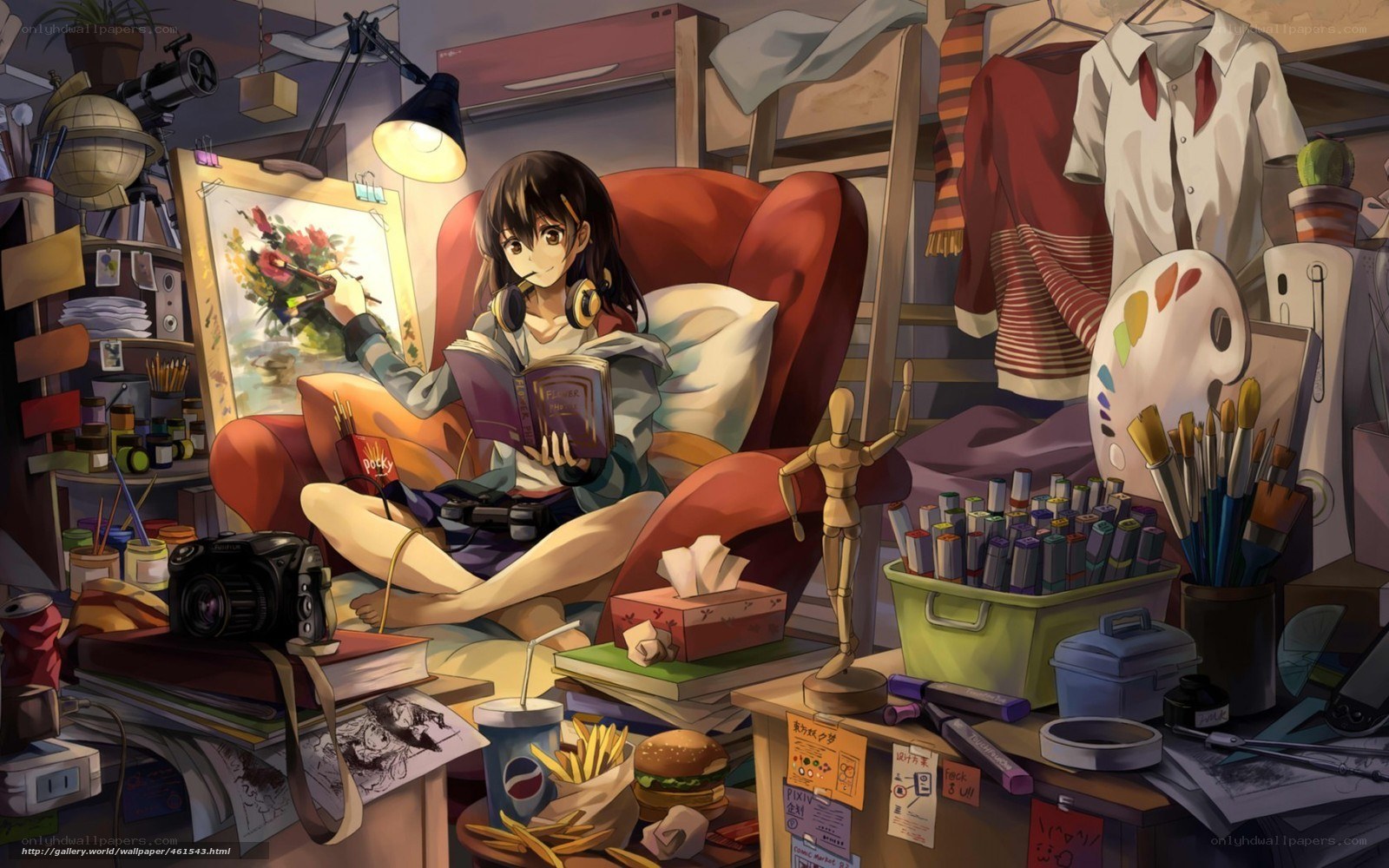 artist in a cluttered studio