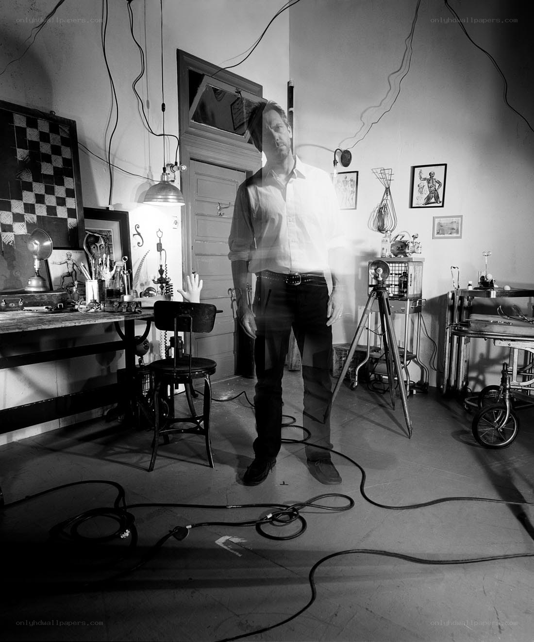artist in a cluttered studio