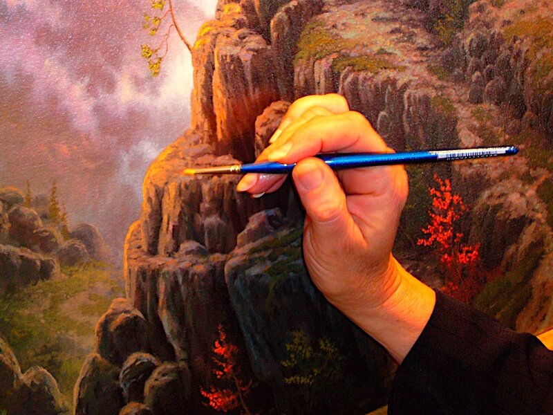 Artist painting a landscape