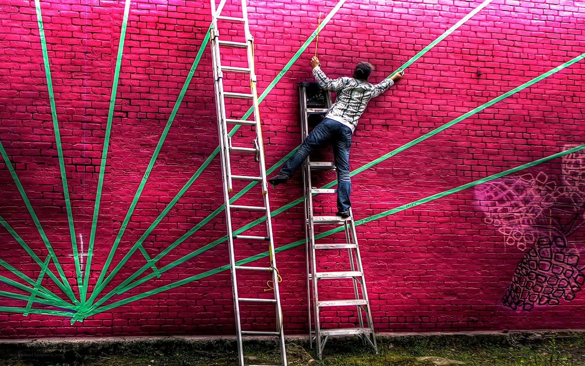 Artist painting a mural