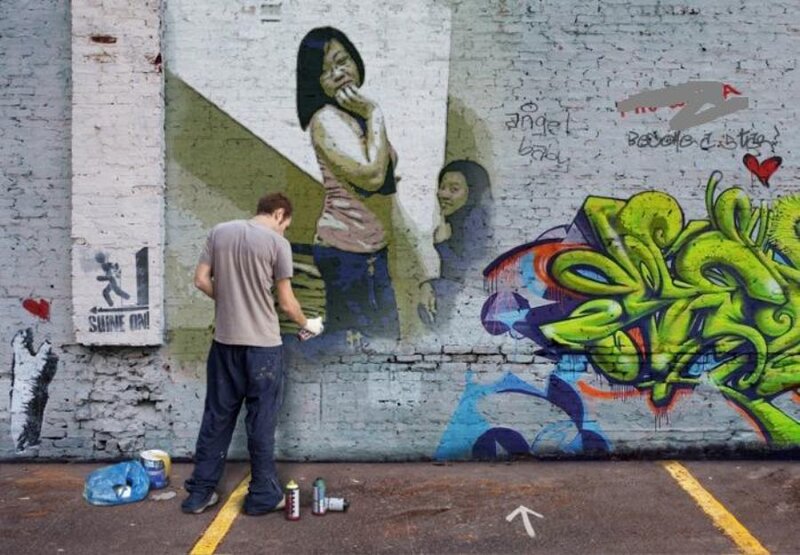 artist painting a mural
