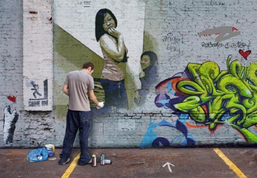 artist painting a mural
