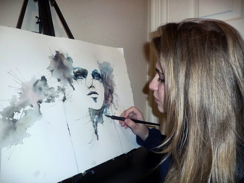 Artist painting a portrait