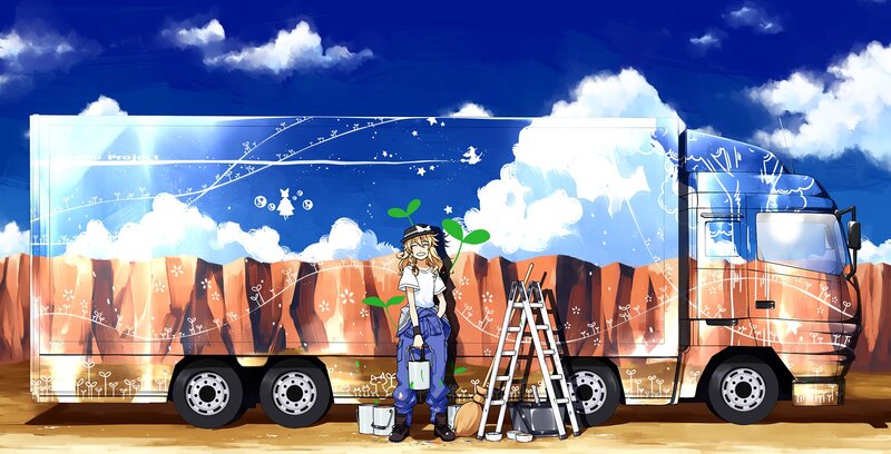 artist painting a truck