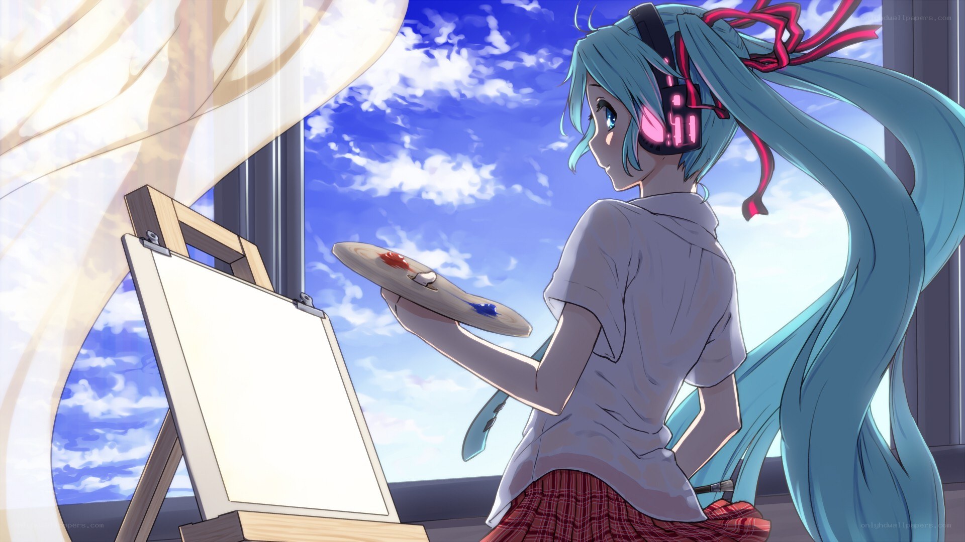 artist painting by window