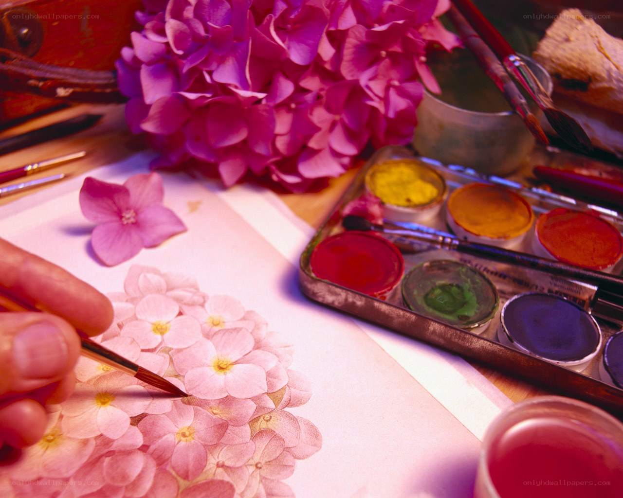 artist painting hydrangeas