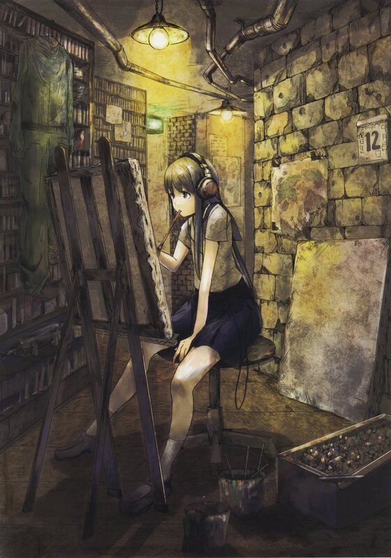 artist painting in a studio