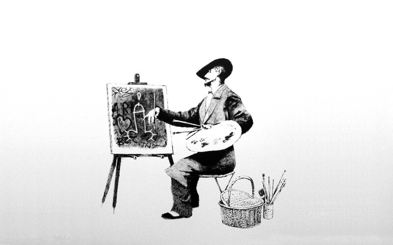 artist painting on canvas