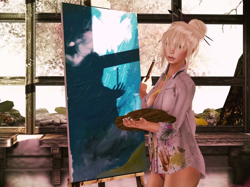 artist painting on canvas