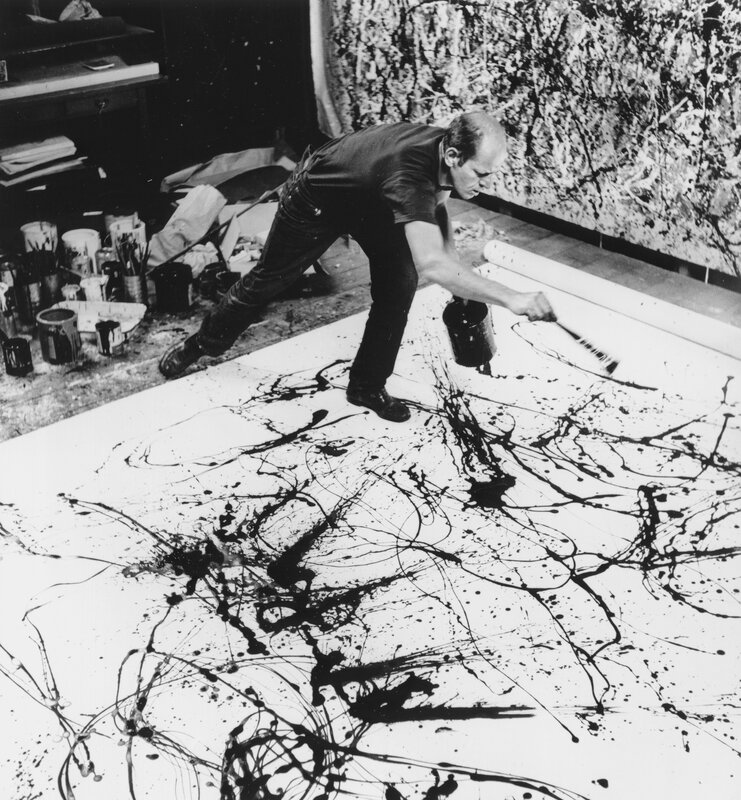 Artist painting on the floor