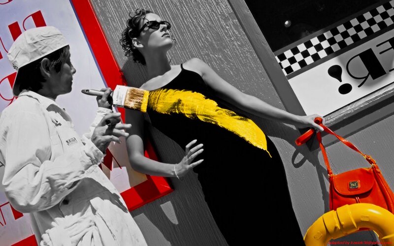 Artist painting woman in yellow