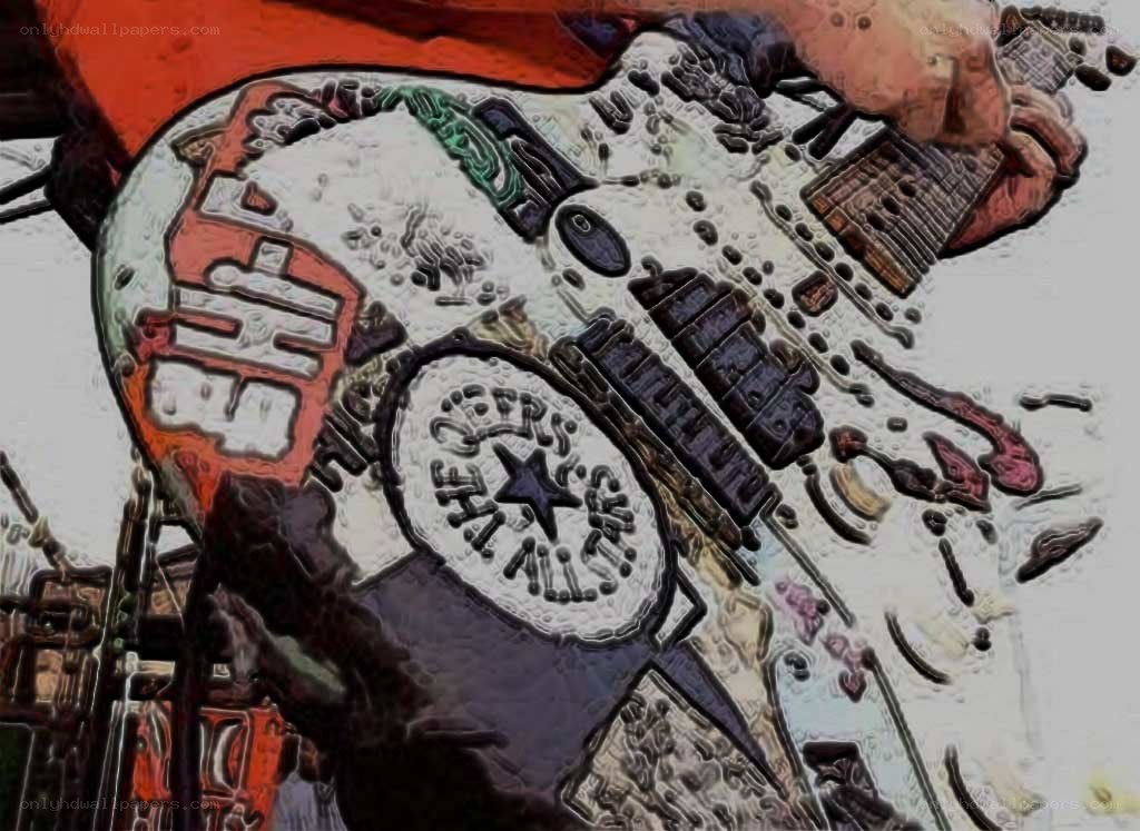 artist playing electric guitar