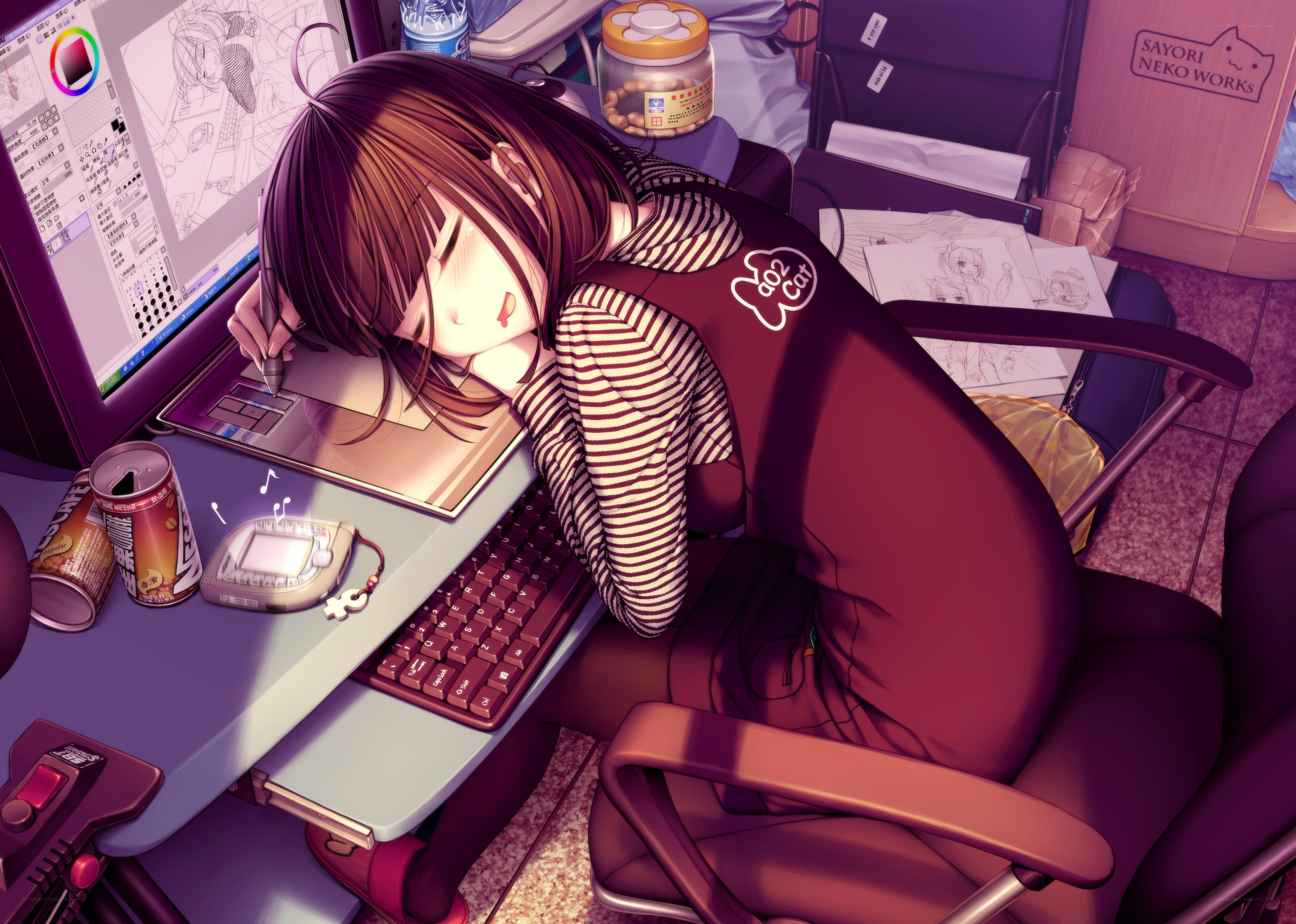 Artist sleeping at desk