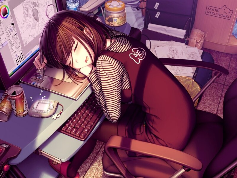 artist sleeping at her desk