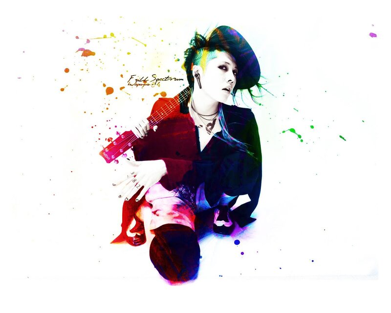 artist with guitar and colorful hair