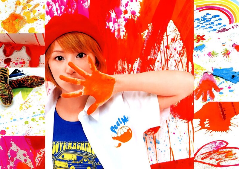 artist with paint-covered hand