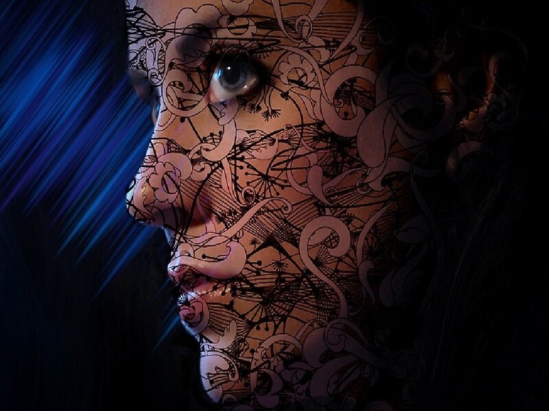 artistic face with intricate patterns