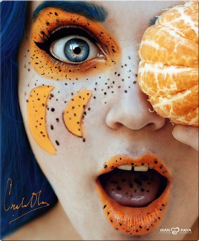 artistic makeup with orange