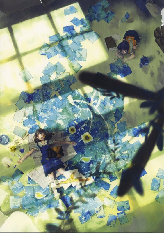 Artists at work in a sunlit room