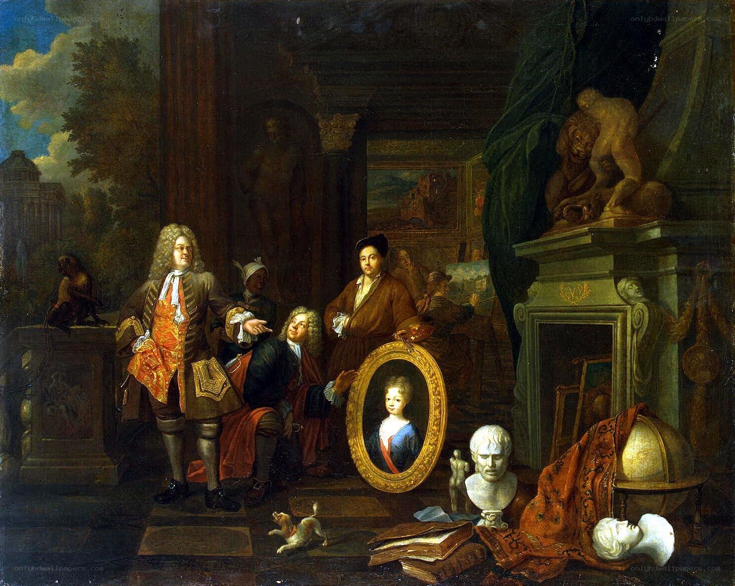 Artists in a studio with portraits