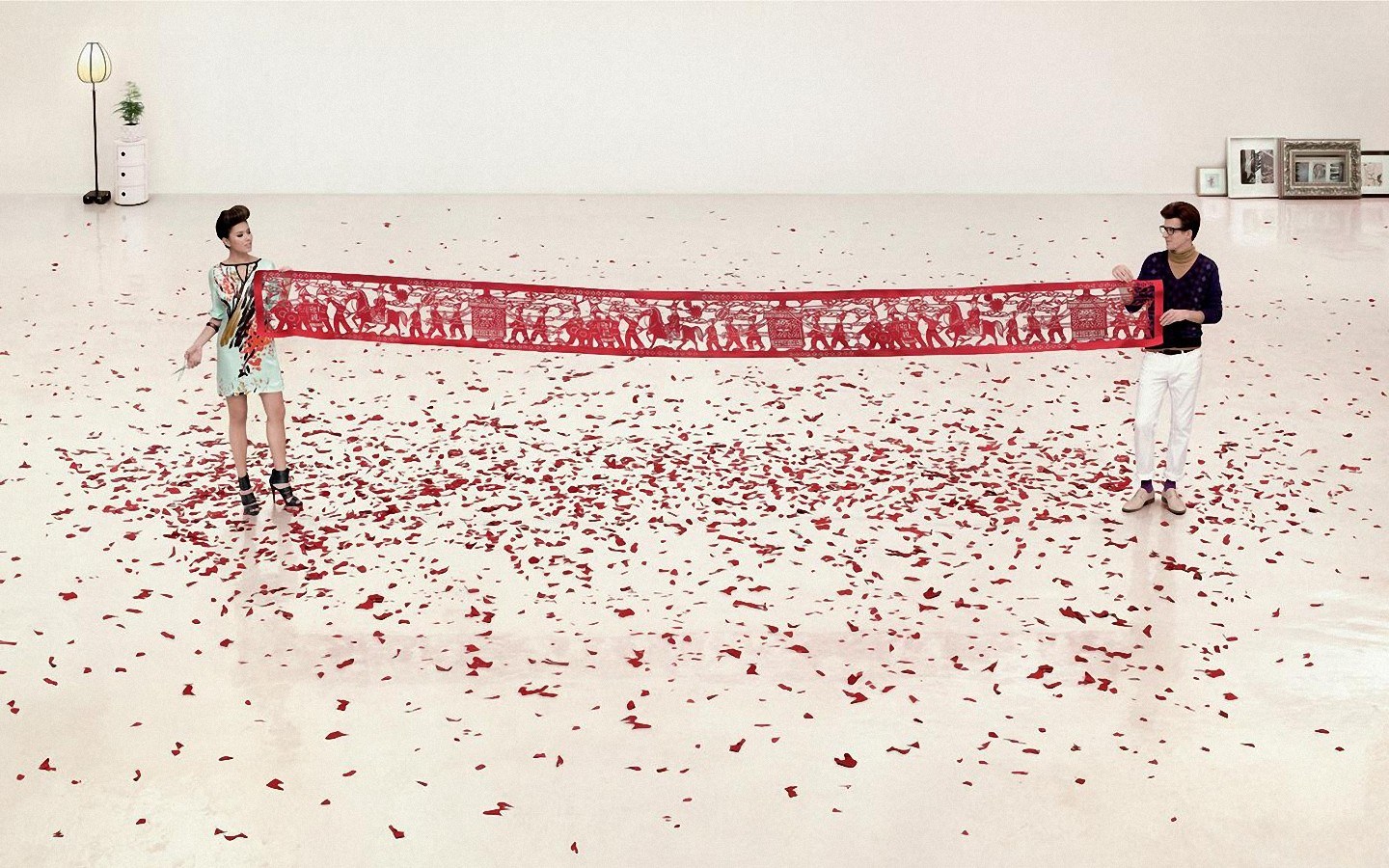 Artists with red paper cutout