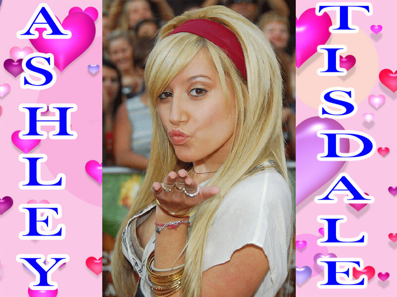 Ashley Tisdale blowing a kiss