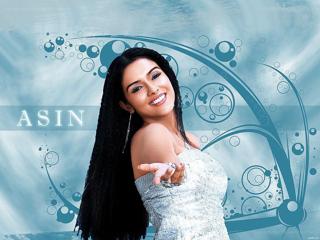Asin in a silver dress