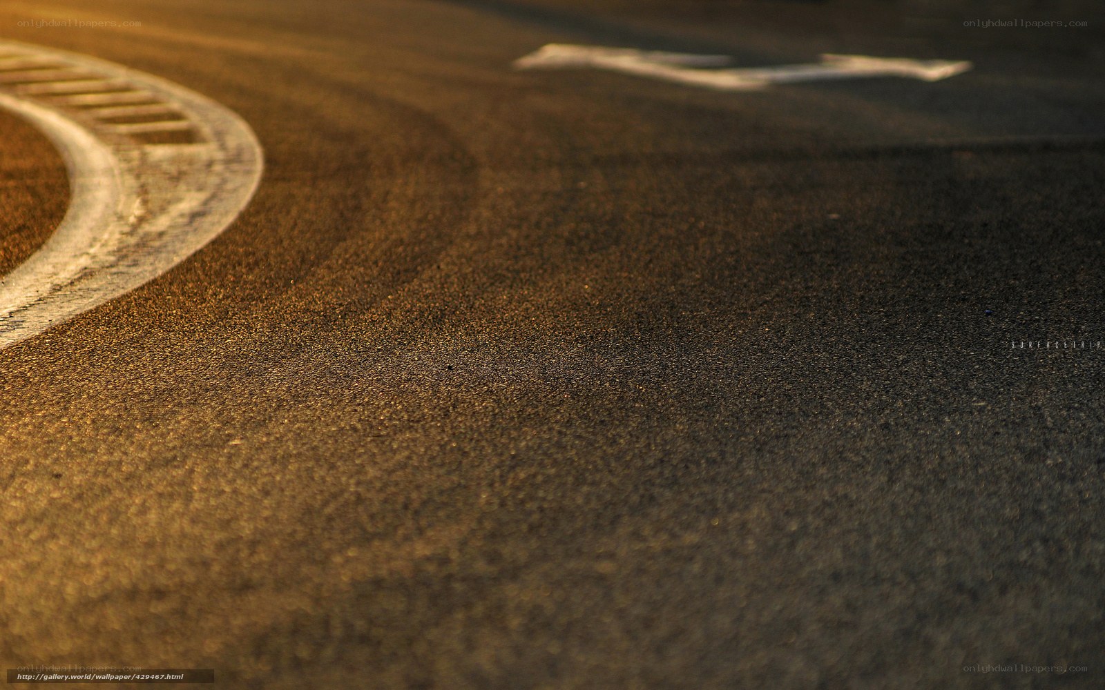 asphalt road at sunset