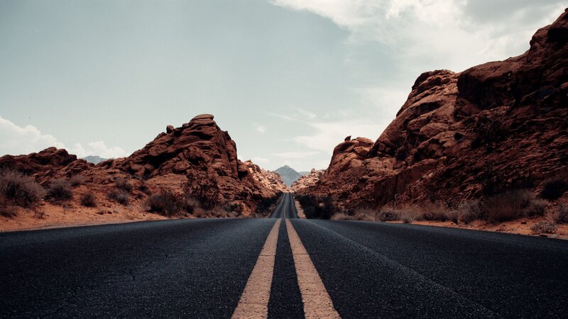 Asphalt Road in Canyon — Black, Desolate