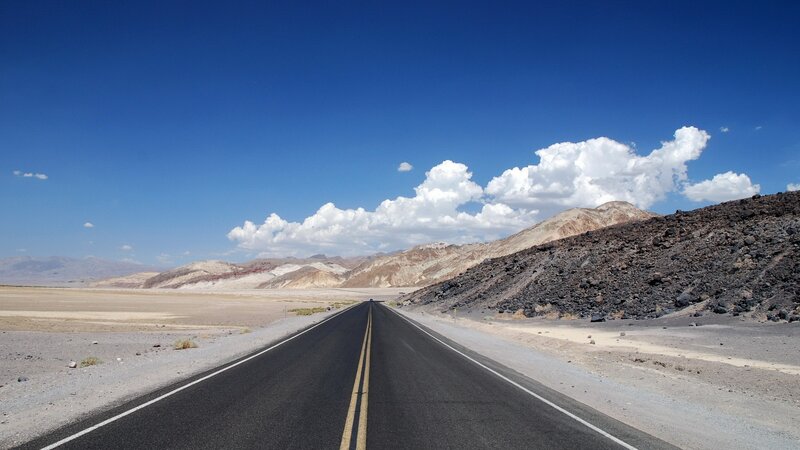 Asphalt Road in Desert — Blue, Serene, Afternoon, Photograph, Mountains, Clouds