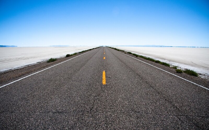 Asphalt Road in Desert — Blue, Serene, Afternoon, Photograph, Salt Flat