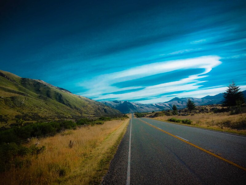 Asphalt Road Through Mountains