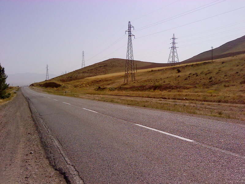 Asphalt Road with Power Lines