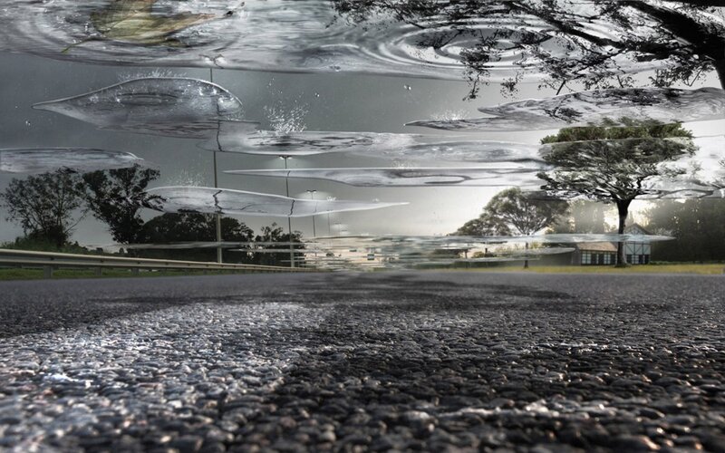 Asphalt Road with Water Reflections — Gray