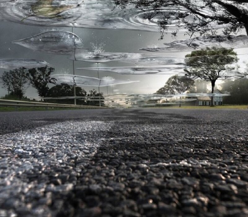 Asphalt Road with Water Ripples