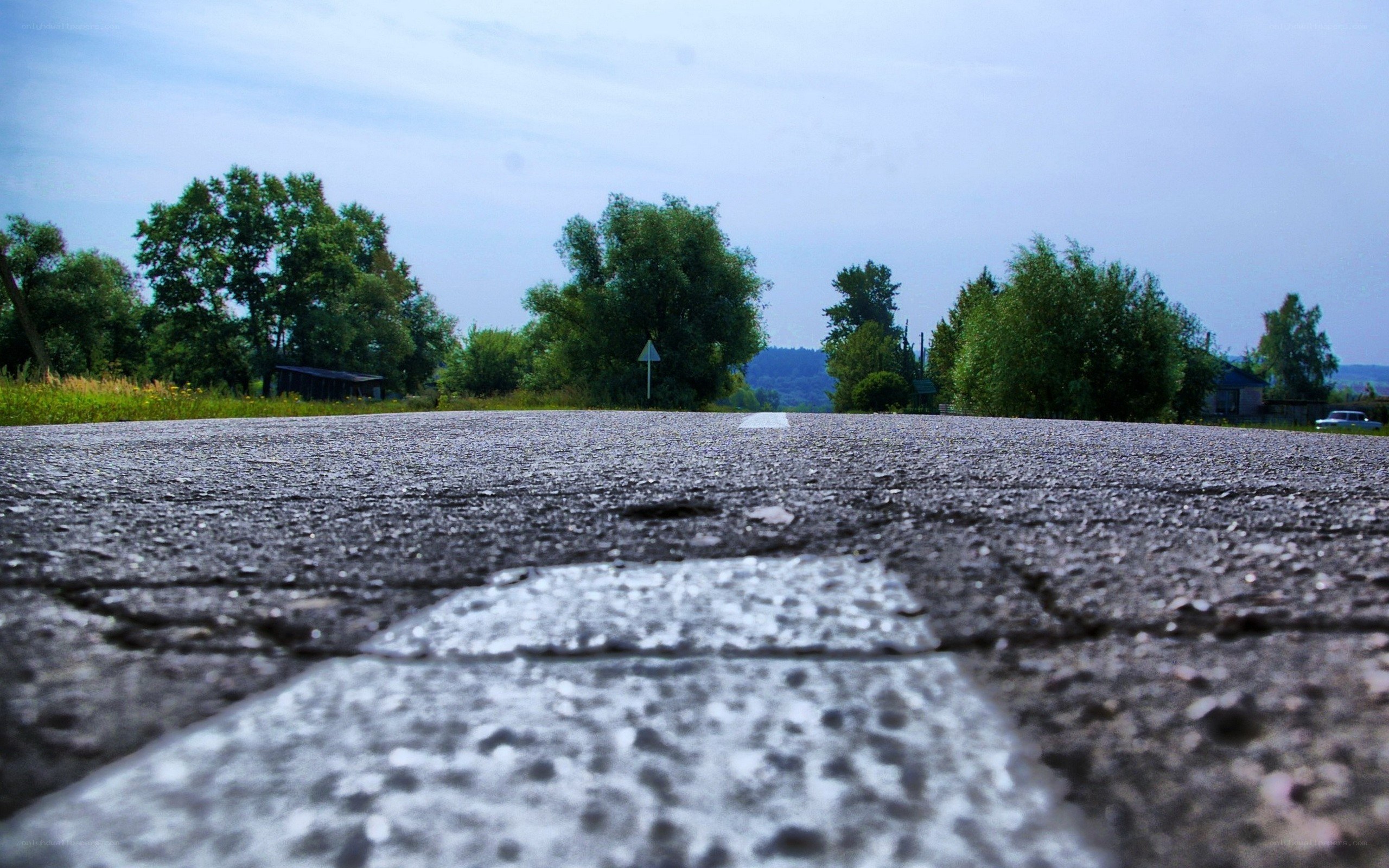 asphalt road with white lines